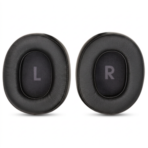 Coussinets noirs JBL sur fond blanc avec ombres douces