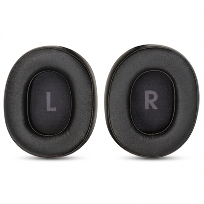 Coussinets noirs JBL sur fond blanc avec ombres douces
